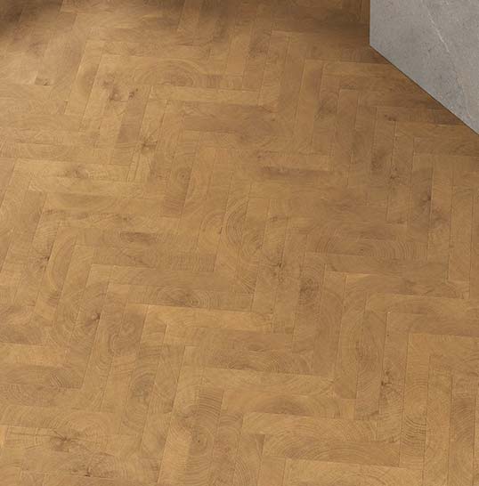 Carrelage céramique effet bois posé en chevrons, relief naturel et texture chaleureuse